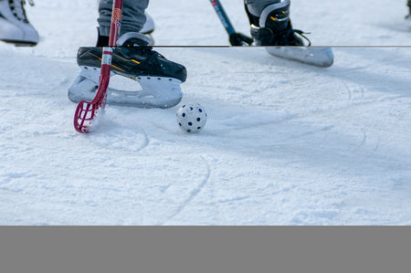 Close Up of Boys playing Ice Hockey on blurred backgroundの写真素材