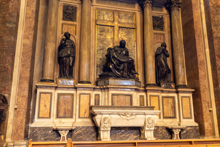 The Statue of the PietÃ  of Michelangelo Sculpted in Black Marble inside the Church Of Sant'Andrea della Valle, in Rome on blurred backgroundの写真素材