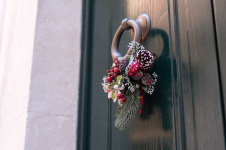 Christmas Decoration on a Beautiful Door in the Old Town of Martina Franca, Italy on Blurred Backgroundの写真素材