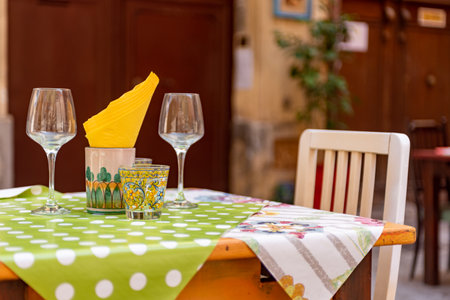 Close Up Of A Table Of A Restaurant In Italy On Blurred Backgroundの写真素材