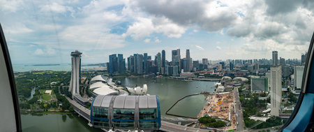 Wallpaper Panoramic View Of The City Of Singapore Taken By The Panoramic Wheel In A Cloudy Day On...