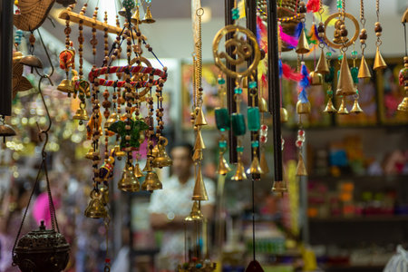 Selling Of Indian Souvenirs On A Stall At The Market On Blurred Background