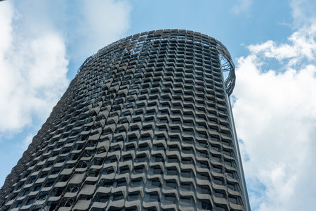 Skyline Of Skyscraper In Singapore On Partially Cloudy Background In Summer
