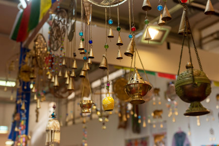 Selling Of Indian Souvenirs On A Stall At The Market On Blurred Backgroundの写真素材