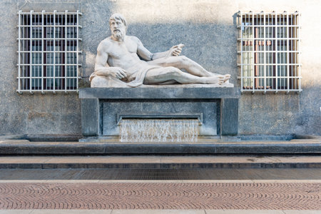 Close Up Of Old Fountain In Turin, Italy, On Blurred Backgroundの写真素材