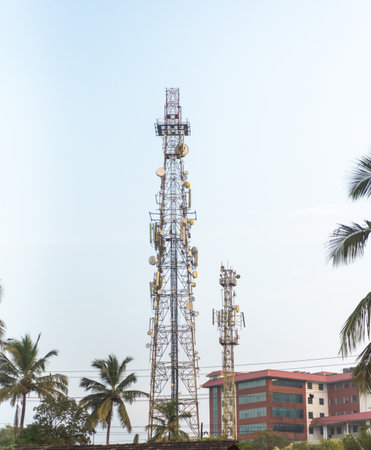 High Communication Antenna Tower In India, On Cloudy Sky Bacgkround