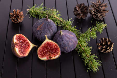 Figs on black wooden tableの写真素材
