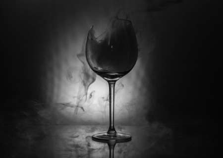 Broken glass in the color smokeの写真素材