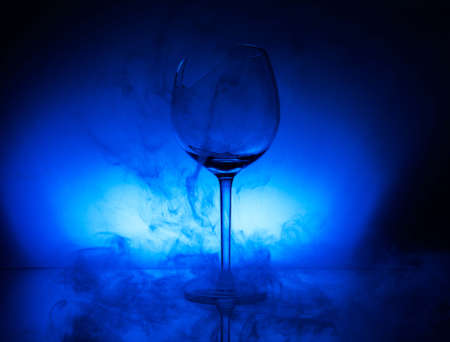 Broken glass in the color smokeの写真素材