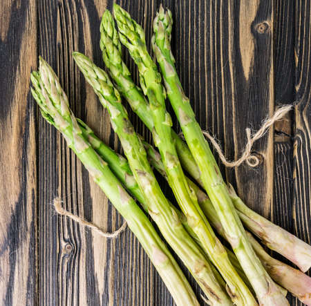 asparagus on wooden backgroundの写真素材