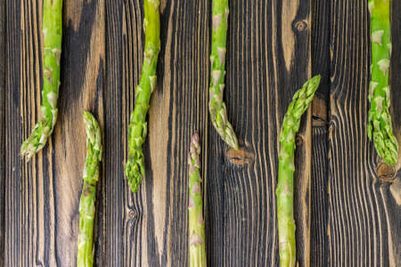 asparagus on wooden backgroundの写真素材