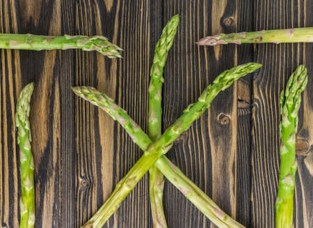 asparagus on wooden backgroundの写真素材