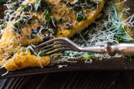Italian cuisine - omelet with herbs and shallots