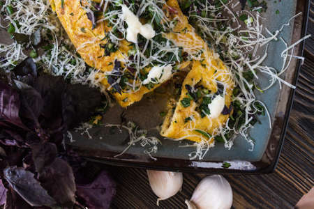 Omelet with herbs, Basil and Parmesan and garlicの写真素材