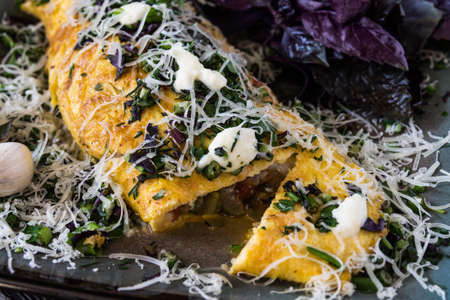 Omelet with herbs, Basil and Parmesan and garlic