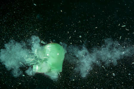 Electric lamp With an air gun destroyed and image freeze in high speed photoの写真素材