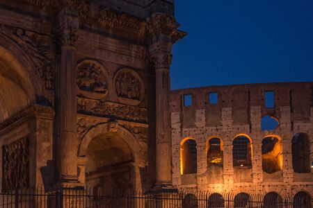 The Colosseum under the glow of lights at night, Romeの写真素材