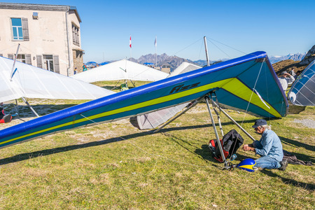 Rochers-de-Naye, Canton of Vaud, Switzerland - October 13, 2018: Hang-gliders in Swiss Alps from top...