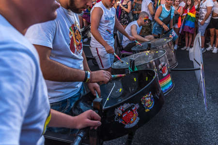 Madrid, Spain - July 06, 2019: in Madrid, Gay pride day celebrations. A group of people drumming