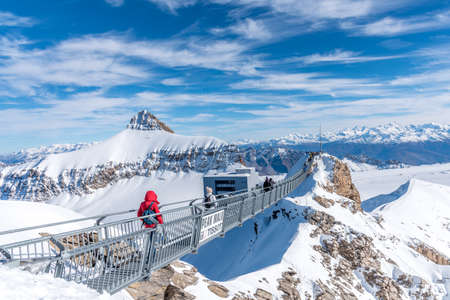 Glacier 3000, Switzerland, October 31,2020::People walking along the footbridge at 3000 meters above sea level.のeditorial素材