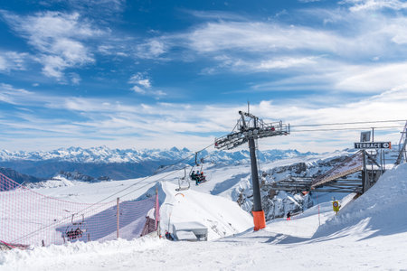 Glacier 3000, Les Diablerets, Switzerland-October 31, 2020: View of chairlifts and the structure through which it runs.のeditorial素材