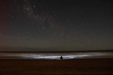 Photograph of a man by the sea in Buenos Aires, Argentina looking at the Orions Belt