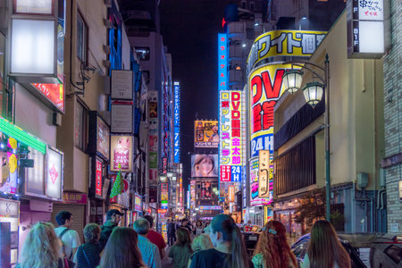 Tokyo, Shinjuku, Japan - July 18, 2019: Nightlife area with many entertainment hotspots and neon lights.のeditorial素材