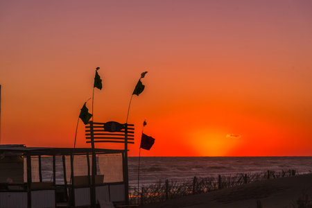 Beautiful sunset on the sea coast. Travel and summer concept.の写真素材