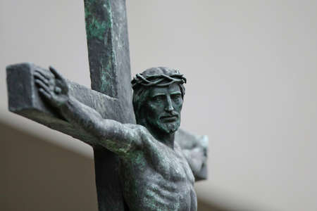 A statue of Jesus with selective focus on the face.の写真素材