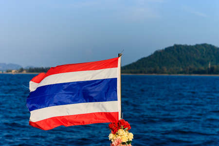 Thai Flag on boat in Andaman sea near Ko Lanta - Thailandの写真素材