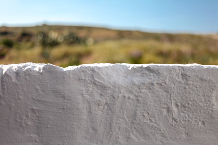 Subjective view of a white stone fence from a houseの写真素材