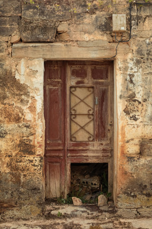 facade with windows of an old stone houseの写真素材