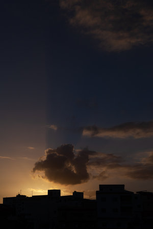 Sunset in the city with clouds in the sky. High quality photo