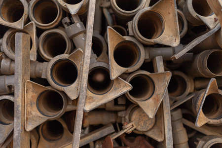 Pile of old rusty metal pipes. Close-up. Background.の写真素材