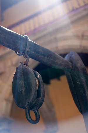 wooden pulley in a water well inside the house of Columbus on the Canary Island of Gran Canariaの写真素材