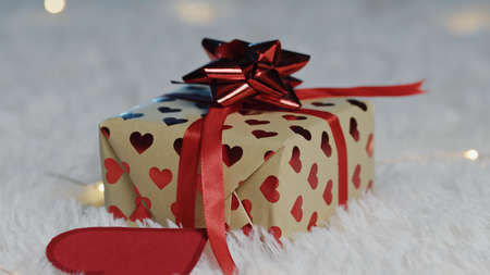 Gift red box on the ground and white carpetの写真素材