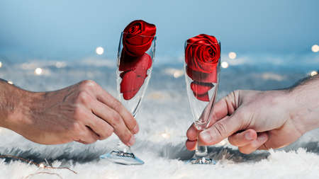 clinking Glasses of Champagne on white carpetの写真素材