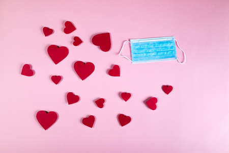 Covid background for valentines day with maskの写真素材