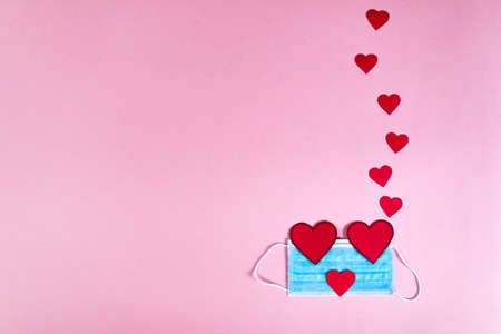 Covid background for valentines day with maskの写真素材