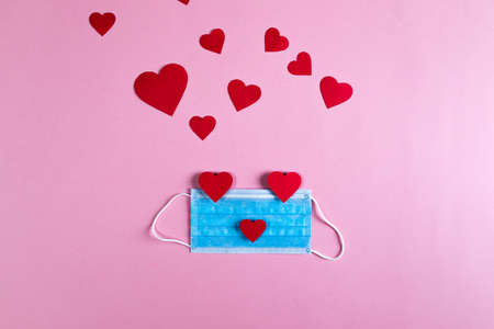 Covid background for valentines day with maskの写真素材