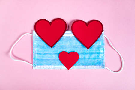Covid background for valentines day with maskの写真素材