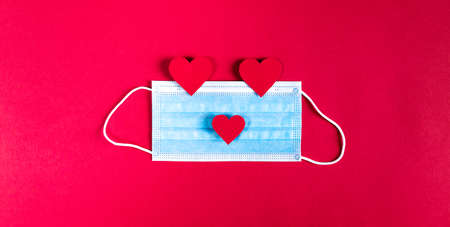 Covid background for valentines day with maskの写真素材