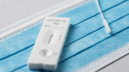 Making the covid swab test in the houseの写真素材