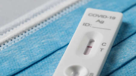 Making the covid swab test in the houseの写真素材
