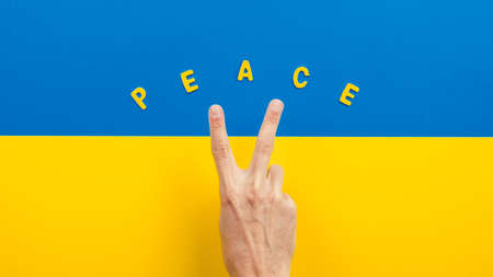 Hand lettered text peace on the flag of Ukraineの写真素材