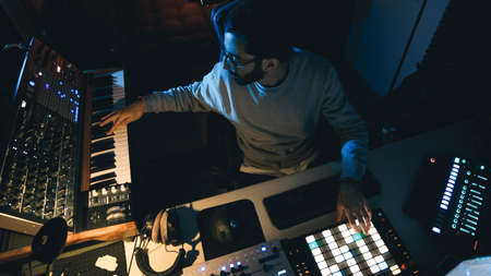 Dj producer is mixing a new music trackの写真素材