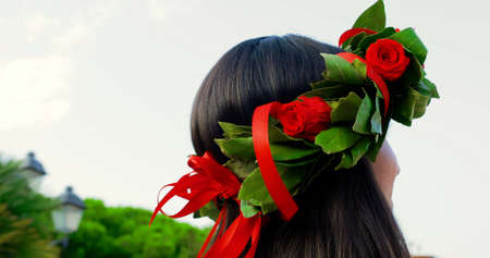Girl with laurel wreath on her head symbol of graduation in the Italian university