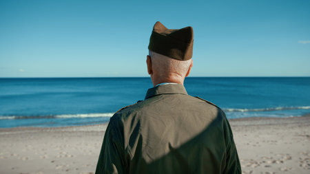 United States America Veteran Man Makes Salute Looking At The Ocean At The Beach