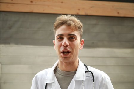 Enthusiastic Doctor Prepares To Give Good News To Patient