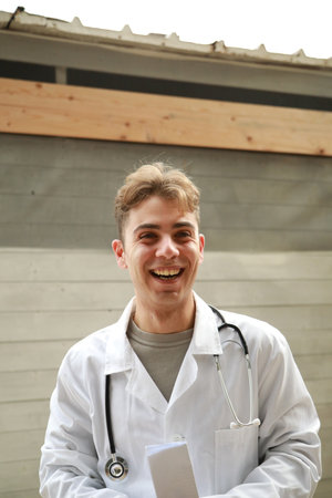 Enthusiastic Doctor Prepares To Give Good News To Patientの写真素材